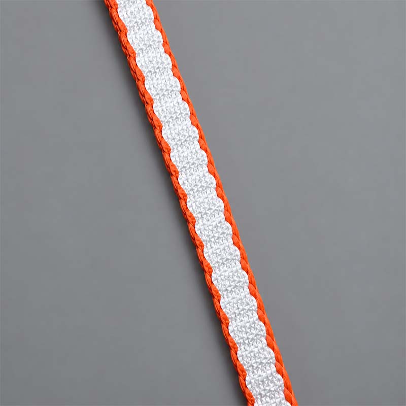 Close-up of white UHMWPE leash webbing with orange edge stitching